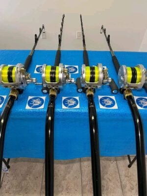 4 Shimano Talica 50II 2 speed reels with rods.